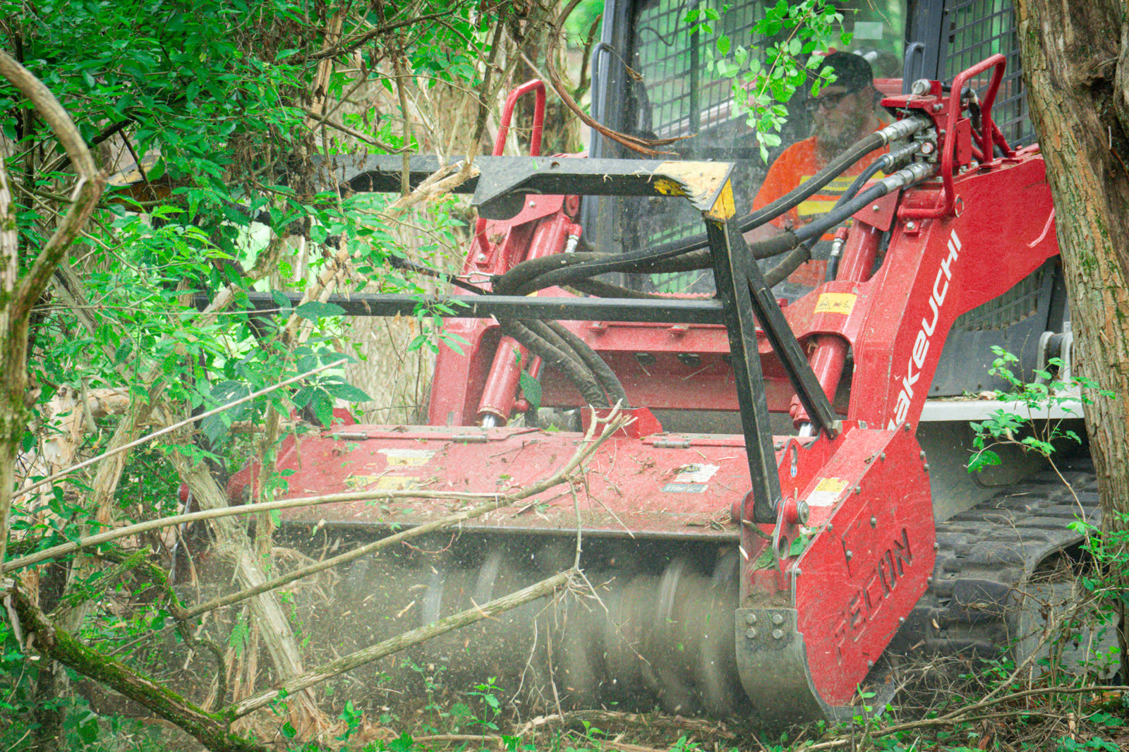 Brushworks forestry mulcher processing saplings, vines, and invasive brush in Ohio